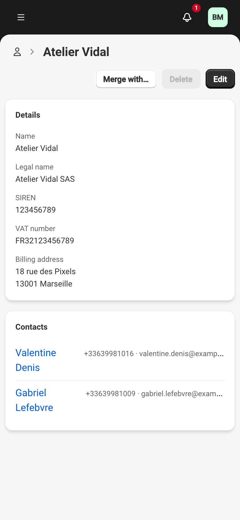 The Atelier Vidal company record: the Details card with the name, legal name, SIREN, VAT number and billing address, then the Contacts card listing Valentine Denis and Gabriel Lefebvre with their phone and email. Above them, Merge with…, a greyed-out Delete, and Edit.