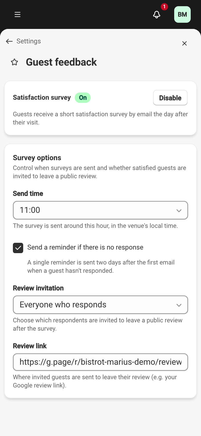 The satisfaction-survey settings screen, enabled: the 'Satisfaction survey' toggle marked On, then the options card — send time, reminder checked, review invitation set to all respondents, and the review-link field filled in.