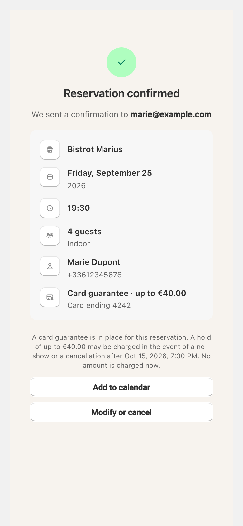 The reservation confirmation showing that a card guarantee is in place.