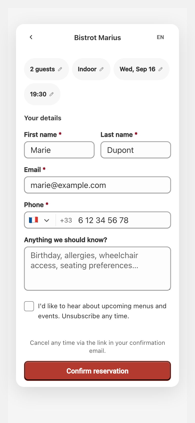 The widget's Your details form, below its top bar showing the venue name and language switcher, filled in by the guest, with the reservation summary and the Confirm reservation button.